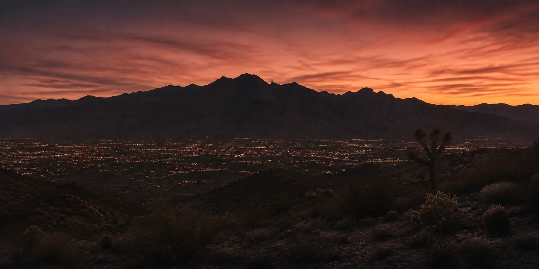 The Las Vegas Valley and surrounding mountains at dusk